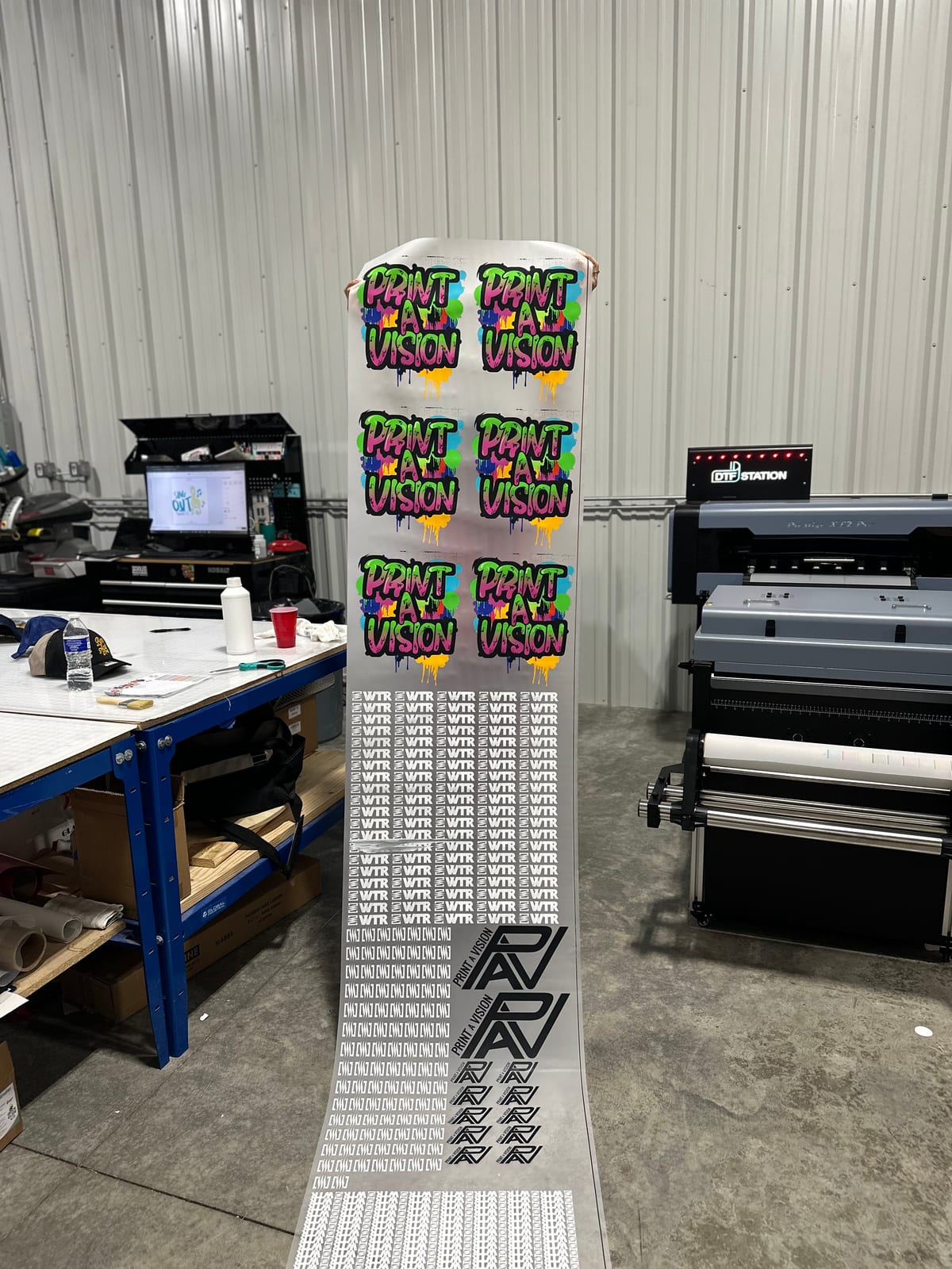 DTF Station Prestige XL2 printer with a freshly printed Print A Vision transfer roll